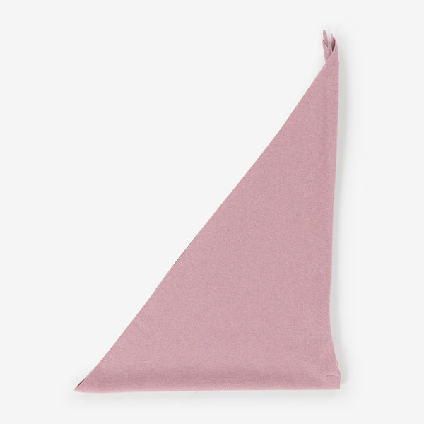 Pink sail-shaped folded cashmere bandana on a white background
