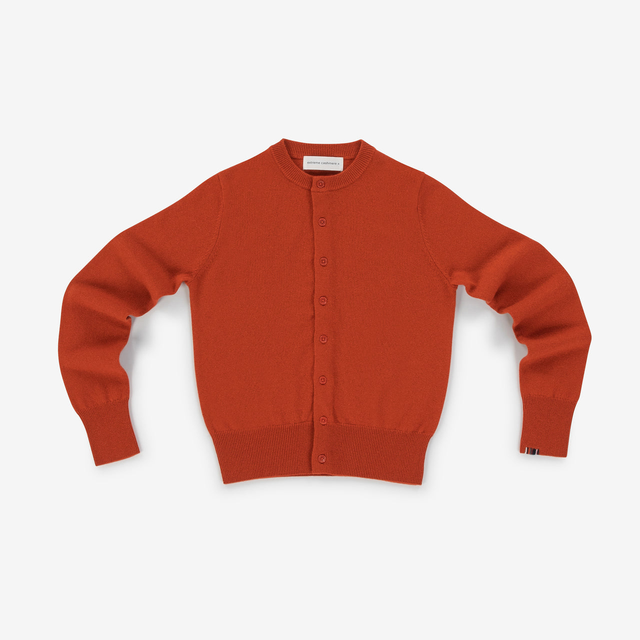 Dark orange cashmere cardigan on a white background