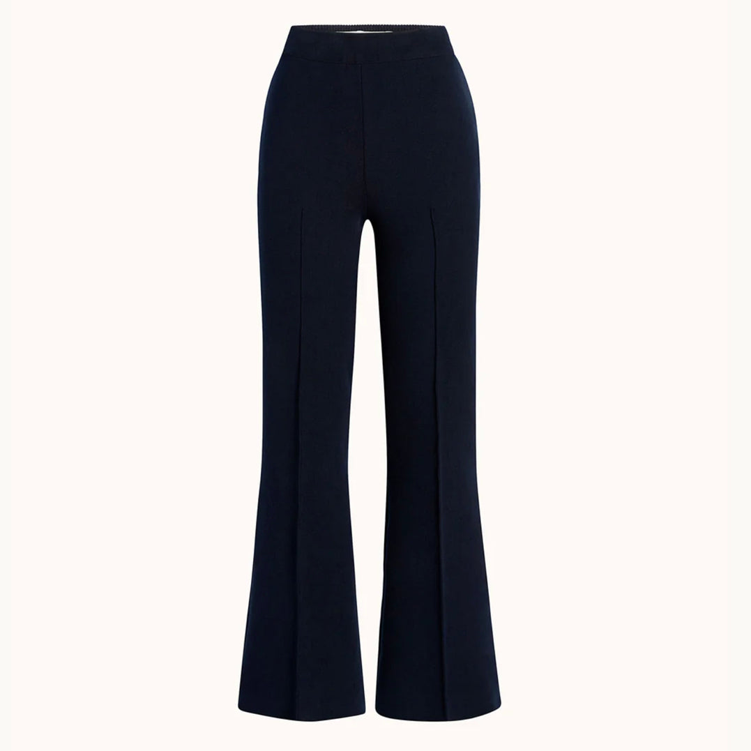 Navy flared pants on a white background