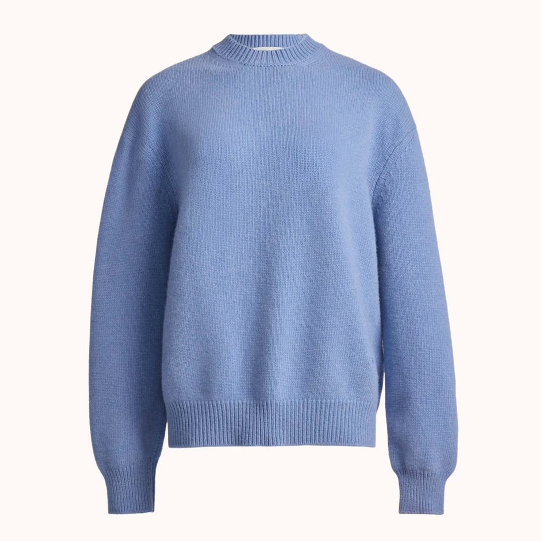 Blue sweater on a white background