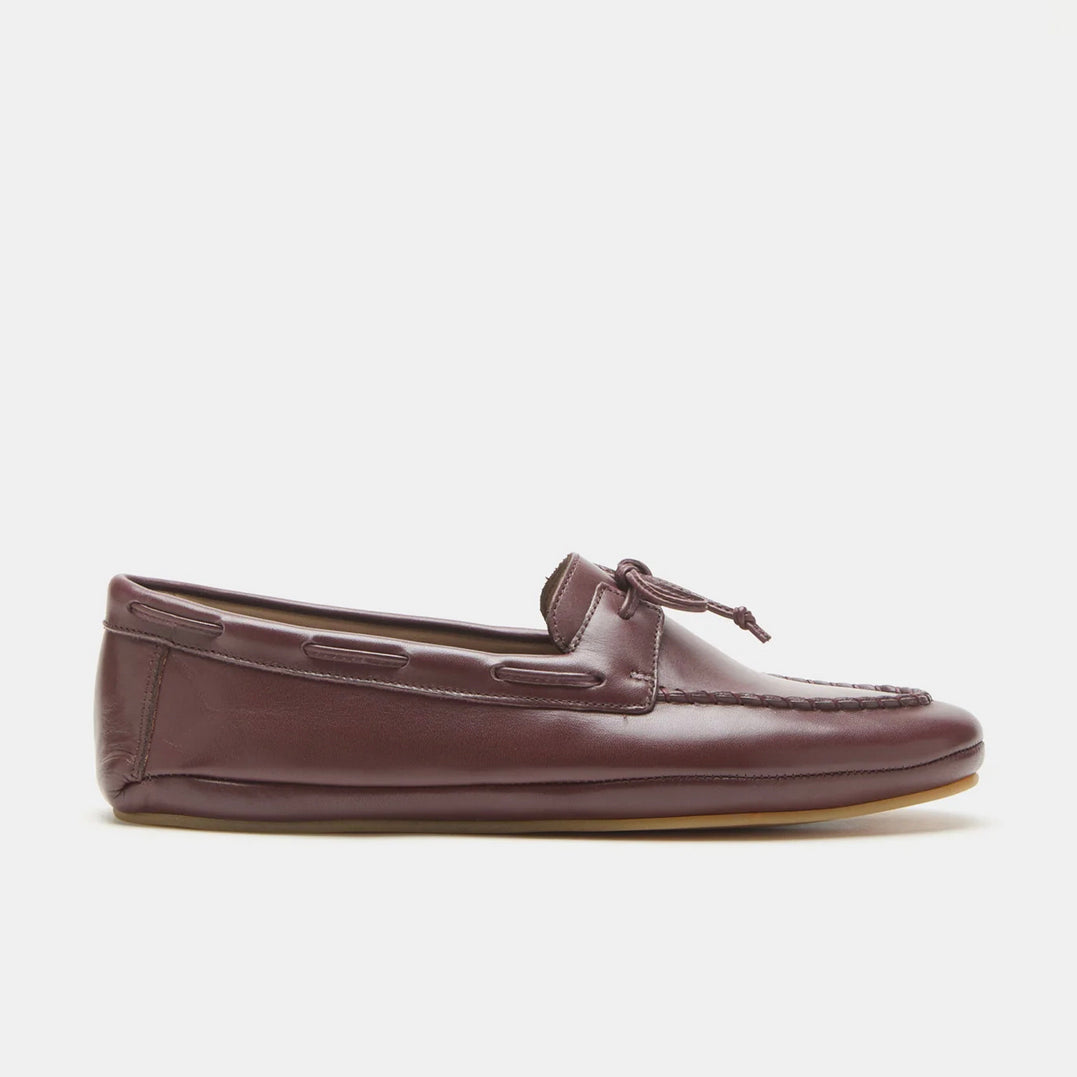 Brown leather loafer shoe on a white background