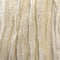 Close-up of textured beige fabric with a subtle pattern