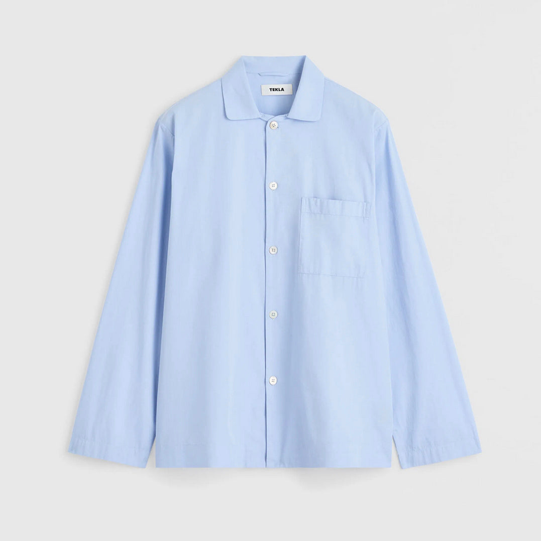Light blue shirt on a light gray background